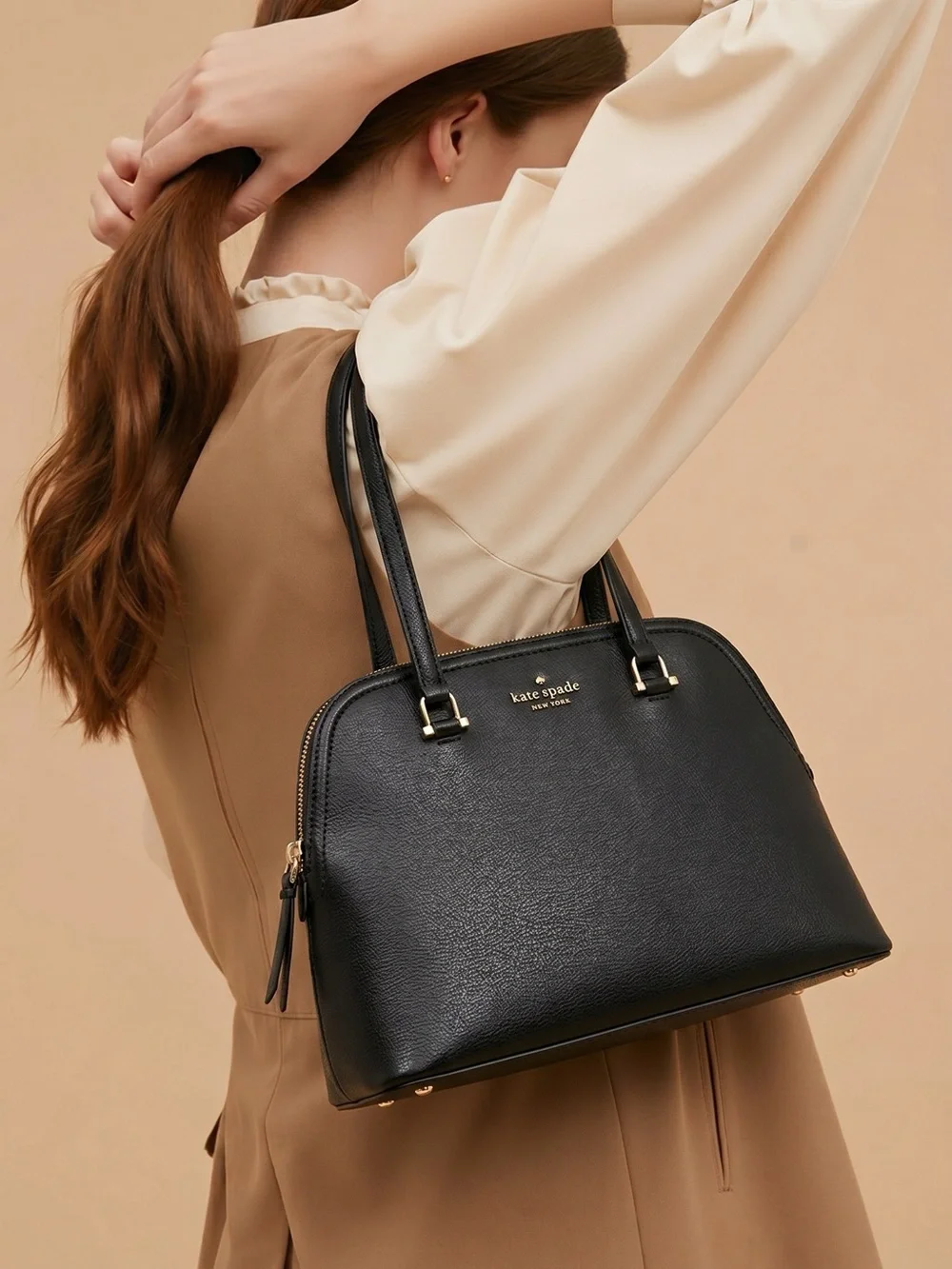 kate spade black leather dome tote with gold-tone accents